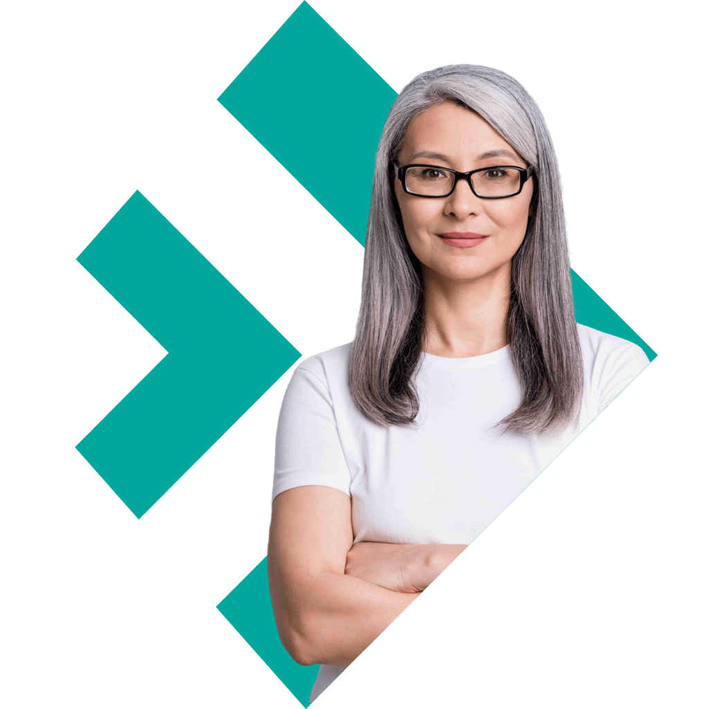 A woman with glasses and a white shirt looking at camera