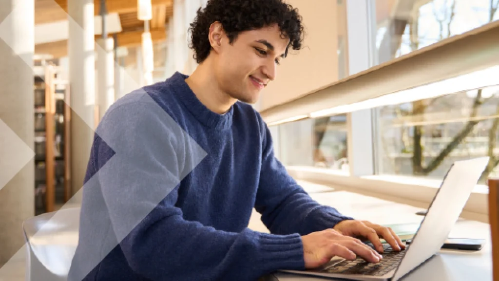 A man working with his laptop.