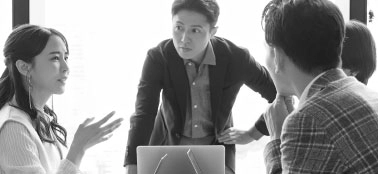 People in a work meeting.